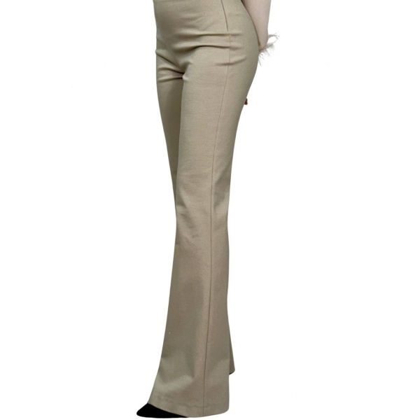 Pantalone Zampa con lana. Beige. Celye