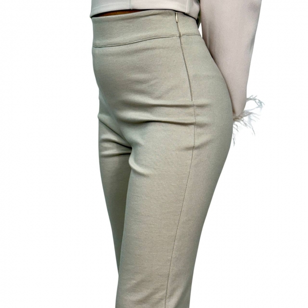 Pantalone Zampa con lana. Beige. Celye