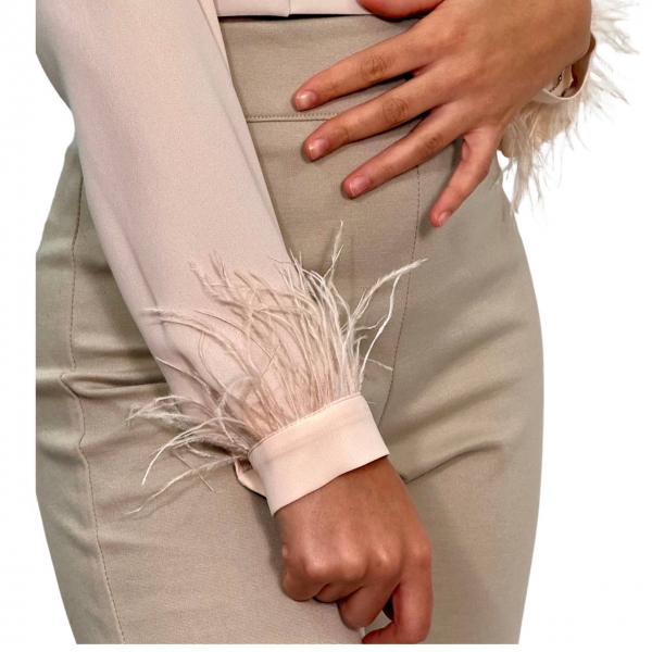 Pantalone Zampa con lana. Beige. Celye