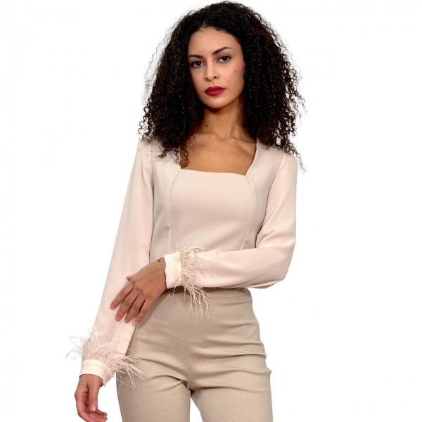 Pantalone Zampa con lana. Beige. Celye